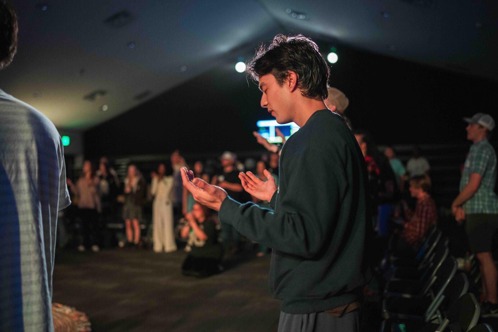 Young adults together at a Sunday morning service